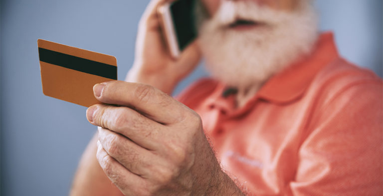 preventing financial abuse dementia man with credit card