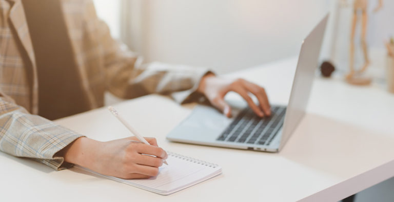 dementia education website working on laptop