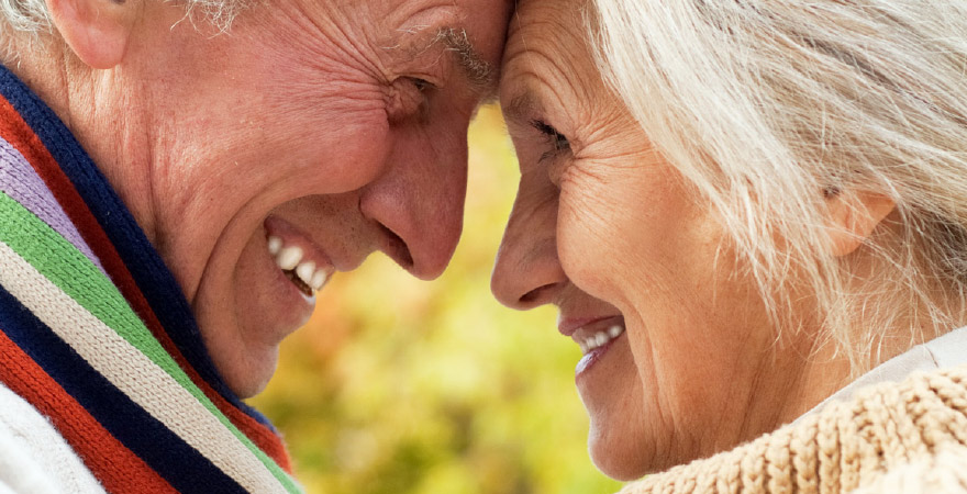 a couple looking deeply into each others eyes