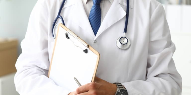 Doctor with clipboard gp management plans